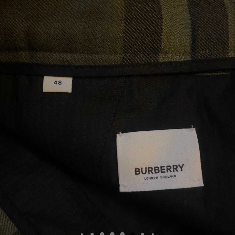 BURBERRY pants received as a gift too small  new but accidentally removed tag .